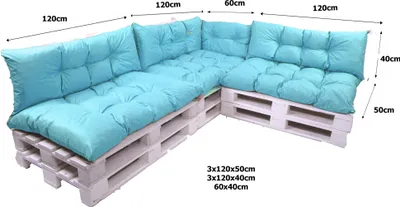 A sectional outdoor sofa made of white wooden pallets and topped with thick, tufted light blue cushions. Dimensions are indicated with text overlays.