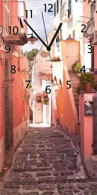Produktbild von Wallario Design Wanduhr bedruckt, Größe 30 x 60 cm, Motiv: Südländische Gasse- Italien bei Sonnenschein