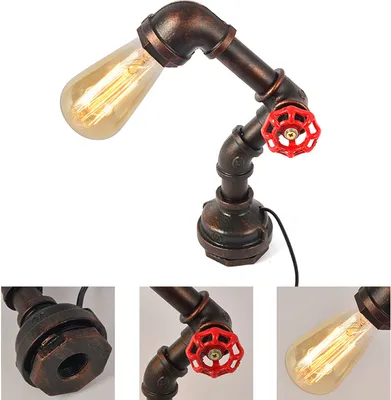 A steampunk-style desk lamp made of metal pipes with a vintage light bulb.