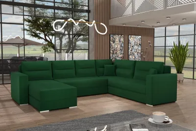 A modern living room with a large green sectional sofa.