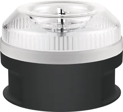 A close-up studio shot of a clear lid and black base of a small appliance.