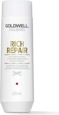 A white bottle of Goldwell Dualsenses Rich Repair shampoo against a white background.