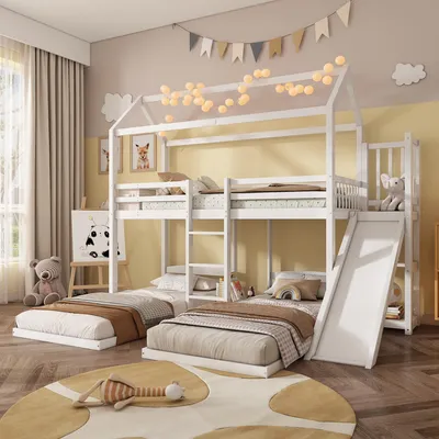 A child's bedroom with a white bunk bed, slide, and two lower beds.