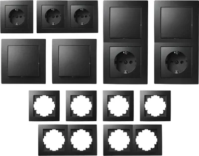 A collection of black electrical switches and sockets, along with their decorative frames, arranged in a grid.