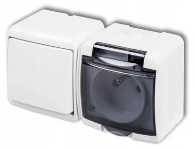 Produktbild von Karlik JUNIOR WGHH-1dp Einpoliger Schalter mit Steckdose IP54