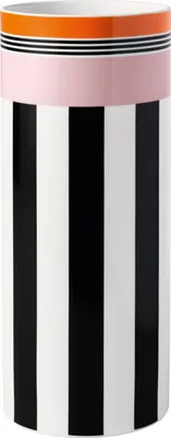 A studio shot of a vase with a striped pattern.