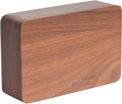 A wooden alarm clock on a white background.
