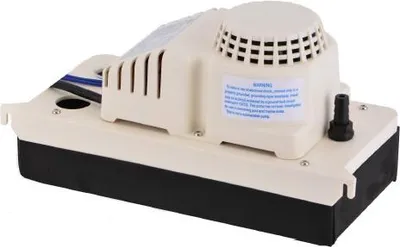 A beige and black condensate pump is shown against a white background.