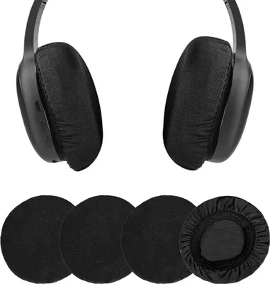 A pair of black headphones with fabric covers and a set of four black circular fabric covers for headphone ear pads.