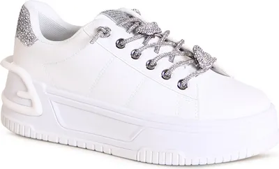A single white sneaker with silver glitter accents and laces is shown against a white background.