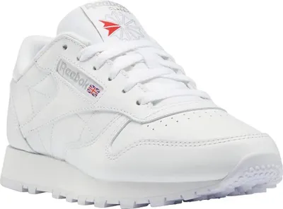 A white Reebok sneaker is shown from a side-angle on a white background.