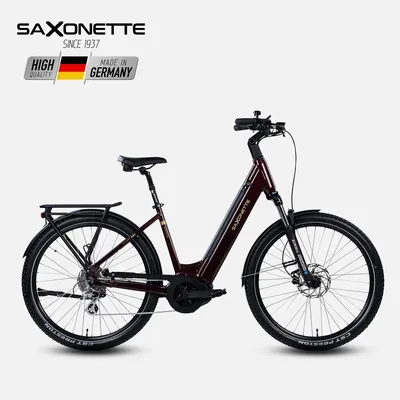 A studio shot of a burgundy electric bicycle against a plain background.