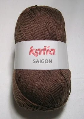 A ball of brown yarn with a white label.
