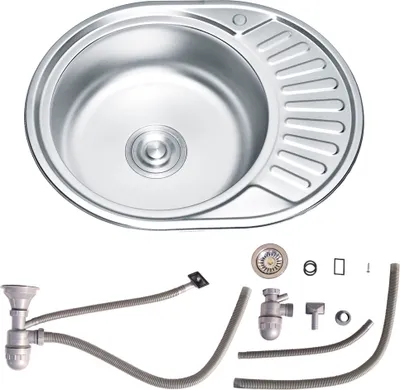A stainless steel kitchen sink and its plumbing accessories are displayed against a white background.