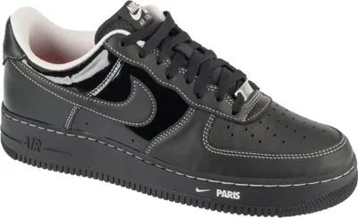 A studio shot of a single black Nike Air Force 1 sneaker.