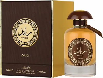 A perfume bottle and its box are displayed side-by-side against a white background.