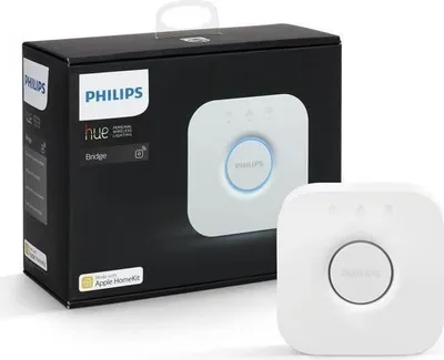 A Philips Hue Bridge and its packaging are displayed against a white background.
