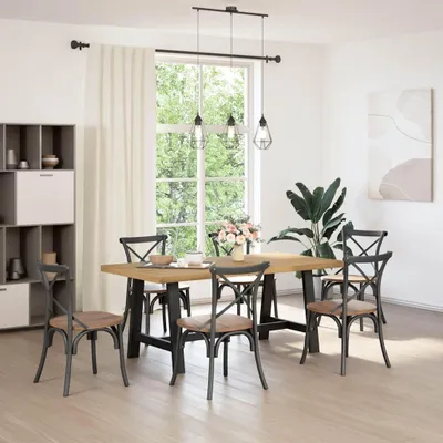 A dining room setting with a table and chairs.