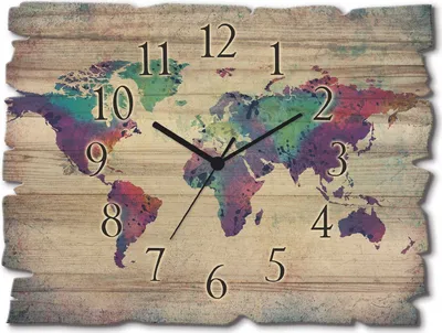 A wall clock with a world map design on a wooden background.
