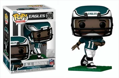 A Funko Pop! vinyl figure of NFL player A.J. Brown of the Philadelphia Eagles, shown both in its packaging and displayed outside of it.