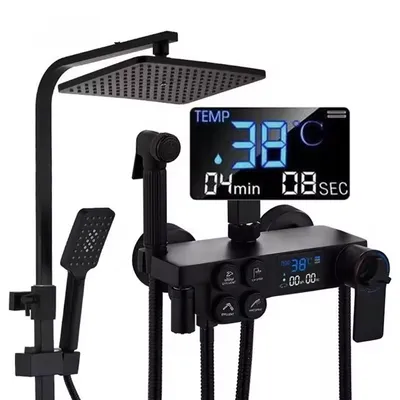 A black shower system with a digital display showing temperature and timer.