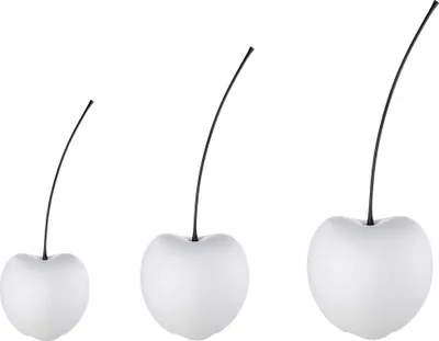 Three white decorative cherries of increasing size, each with a thin black stem, are displayed against a white background.