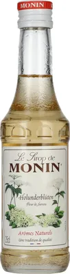 A bottle of Monin Holunder Blüte syrup against a white background.