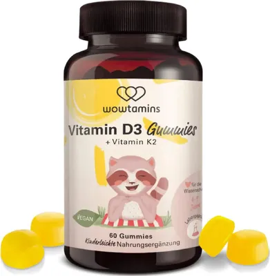 A bottle of Vitamin D3 + K2 Gummies with some gummies scattered around it.