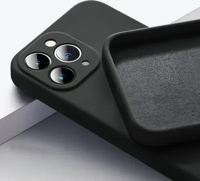A close-up view of the back of a black iPhone case, showing the camera cutout and the interior lining.