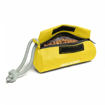 A yellow dog treat pouch filled with dog treats, shown on a white background.