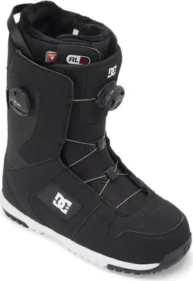 A black snowboard boot with white accents and sole.