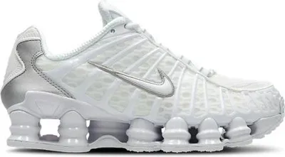 A studio shot of a single Nike Shox TL sneaker.