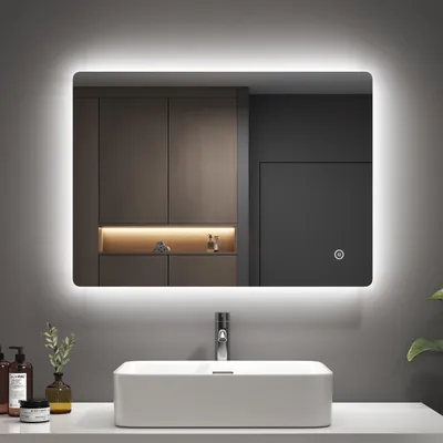 A modern bathroom vanity with a rectangular sink and a backlit LED mirror above it.