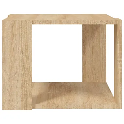 A single, light brown wooden cube-shaped table with an open front, shown against a white background.