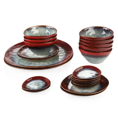 A collection of ceramic dishes and bowls with a gradient color scheme.