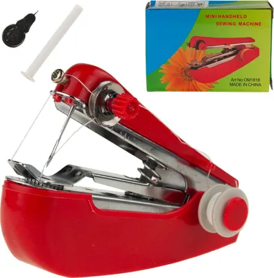A red manual mini sewing machine with accessories and its packaging.