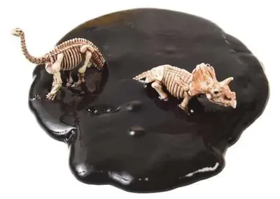 Produktbild von Schwarzer Schleim mit Dinos als Mitbringsel für Dino Fans