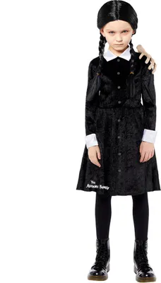 A young girl dressed in a Wednesday Addams costume.