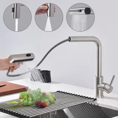 A kitchen faucet with a pull-down sprayer is shown in use, demonstrating its features.