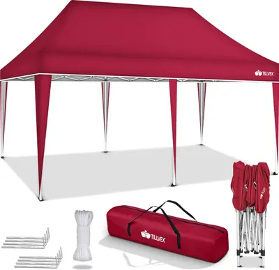 A red pop-up canopy tent and its accessories are displayed against a white background.