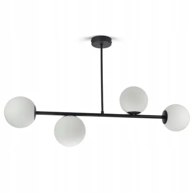A black ceiling lamp with four white glass globes, suspended from a white background.