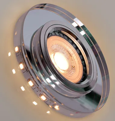 A close-up, angled view of a modern recessed ceiling light fixture.