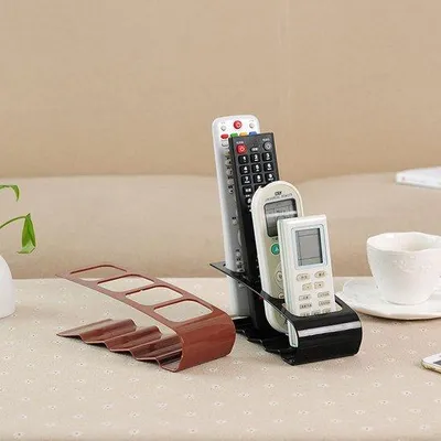 Produktbild von 2 Stahlmetall-Organizerboxen für Fernbedienungen mit 4 Fächern, einfacher Zugriff auf Fernbedienungen für den Fernseher, Accessoires für den Sessel oder als Organizer für den Sofa.
