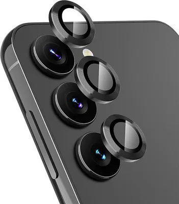 Close-up of camera lens protectors on a smartphone.
