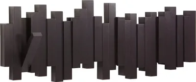 A dark brown wall-mounted coat rack with multiple staggered hooks.