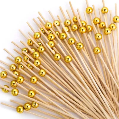 Produktbild von Cocktailspieße Holz 100 Stück mit goldenen Perlen 11,9 cm