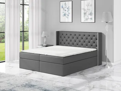 Produktbild von Boxspringbett BARO 160x200 mit 2 Bettkästen, Bonell-Matratze und Topper. Dekorative Stifte an den Seiten der Kopfstütze. Bett Komplett-Set mit Matratze,Bettkasten & Kopfteil. Stoff Eko Cayenne. Elegantes Bett mit massives Kopfteil.