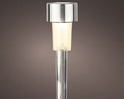 A close-up studio shot of a solar garden light.