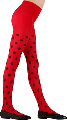 A person's legs wearing red polka dot tights and black ballet flats.