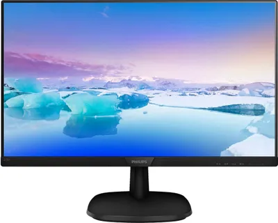 A Philips computer monitor on a stand, displaying a landscape image.